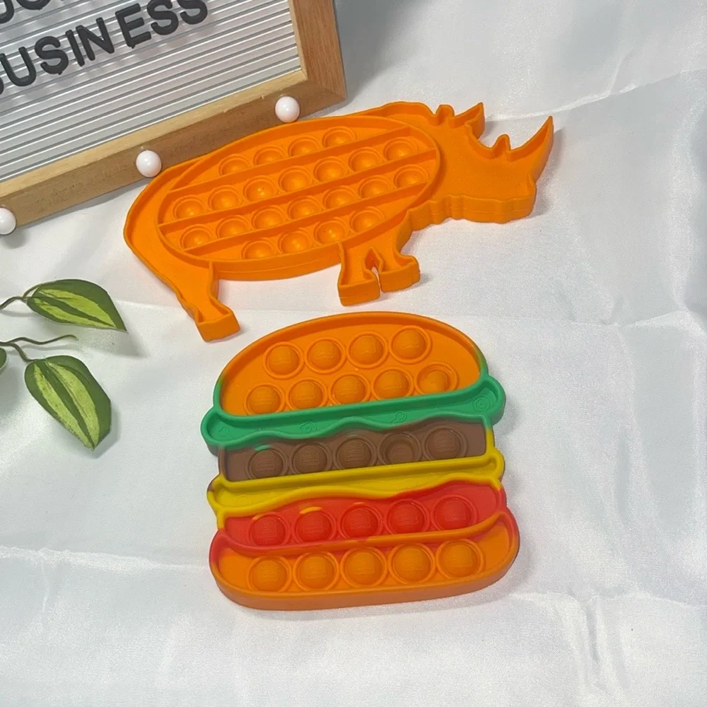 Orange Rhino and Burger Pop It Fidget Toys